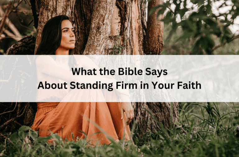Woman in a long orange skirt sits thoughtfully by a large tree in a lush forest. Text overlay reads, "What the Bible Says About Standing Firm in Your Faith."