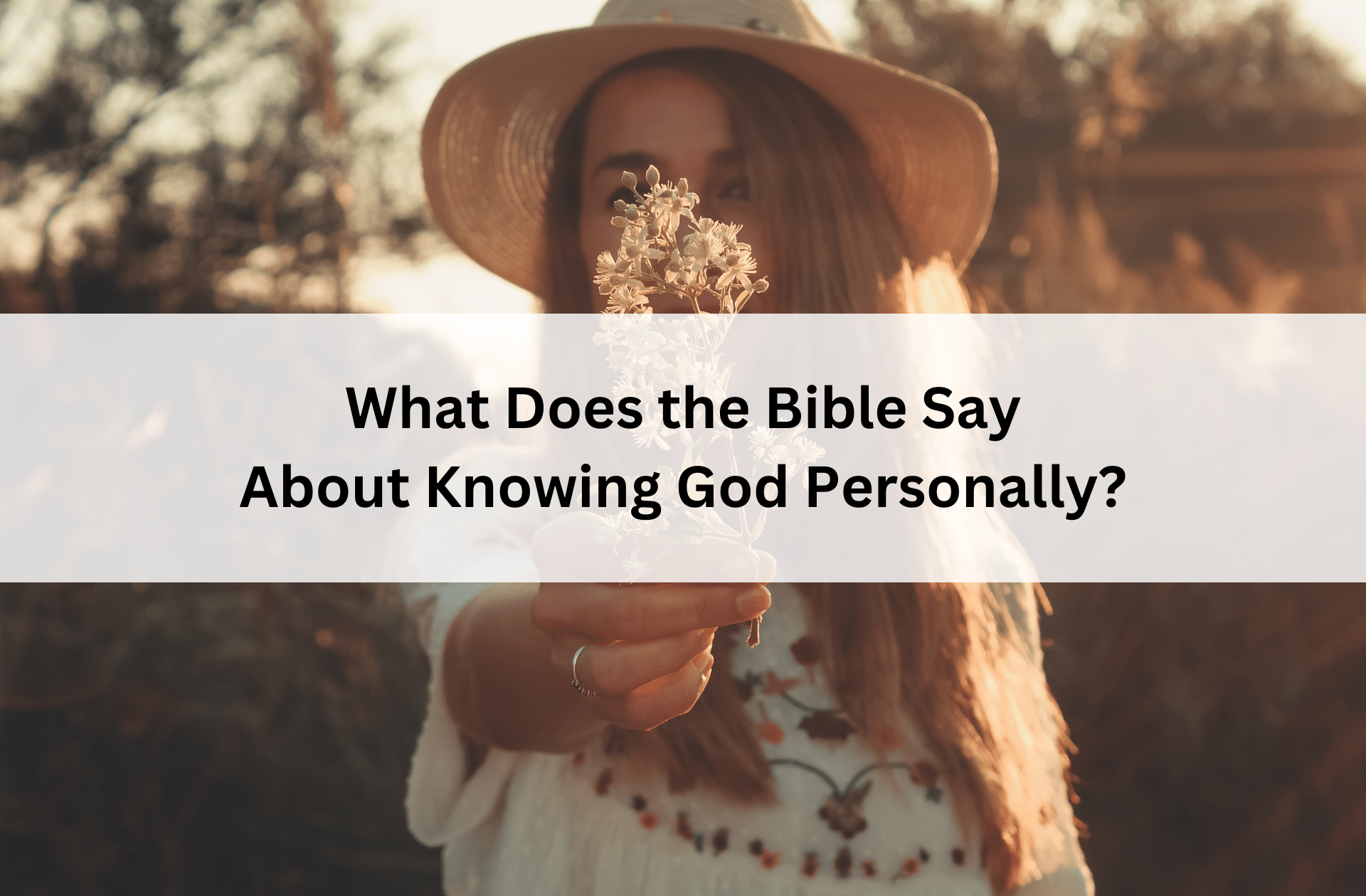Young woman in a sunlit field holds a small bouquet, wearing a hat and floral dress. Overlaid text asks, "What Does the Bible Say About Knowing God Personally?"