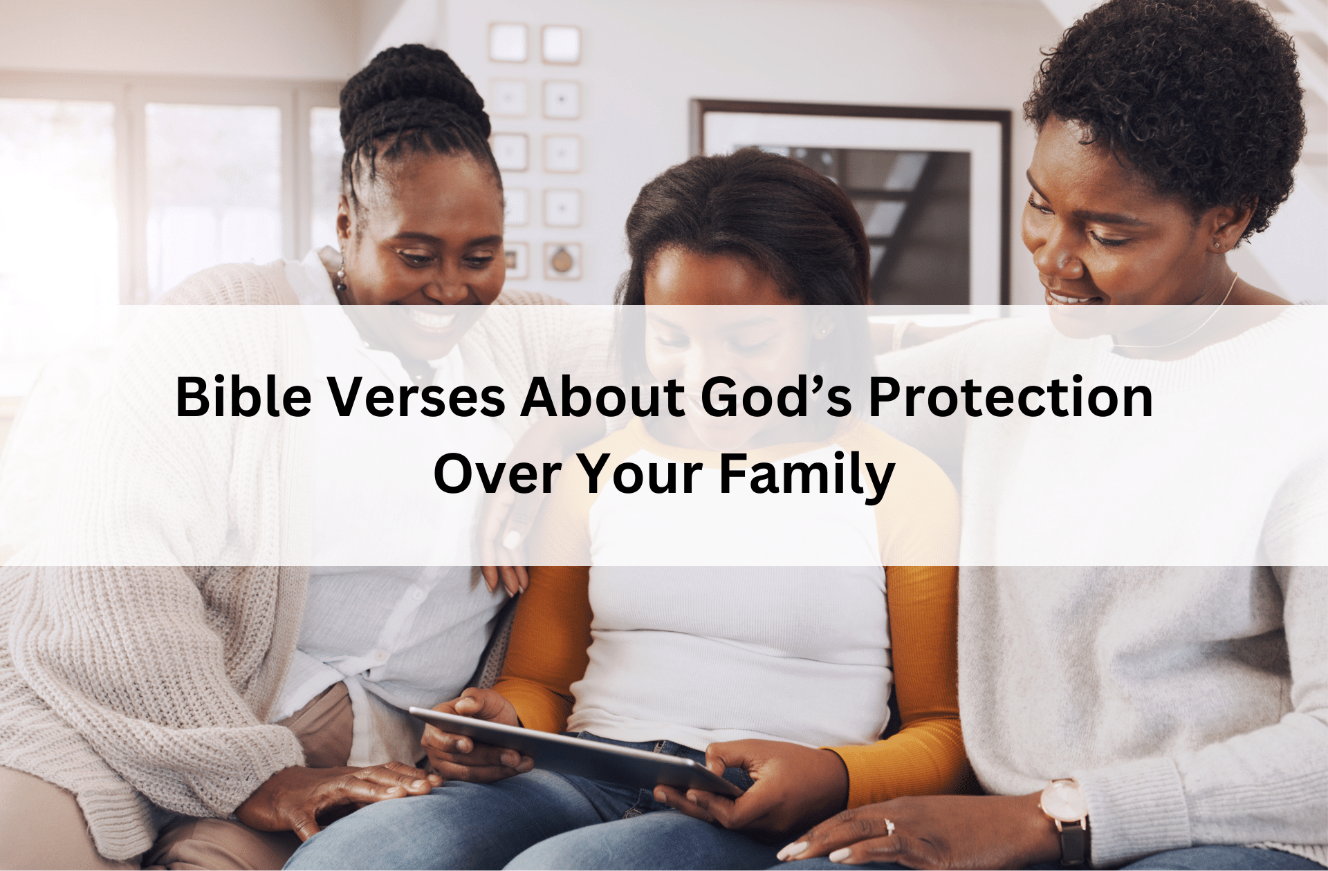 Two women and young girl sitting together smiling and looking at a tablet, with text overlay: “Bible Verses About God’s Protection Over Your Family.”