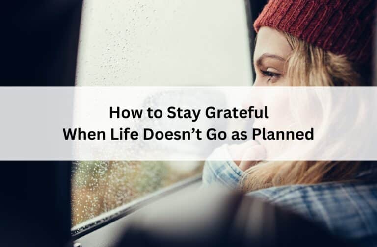 Woman in a red knit hat gazing out a rain-covered car window, lost in thought, with overlay text: “How to Stay Grateful When Life Doesn’t Go as Planned.”