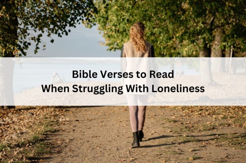 Woman walking alone on a tree-lined lakeside path in autumn; overlay text reads βBible Verses to Read When Struggling With Loneliness.β