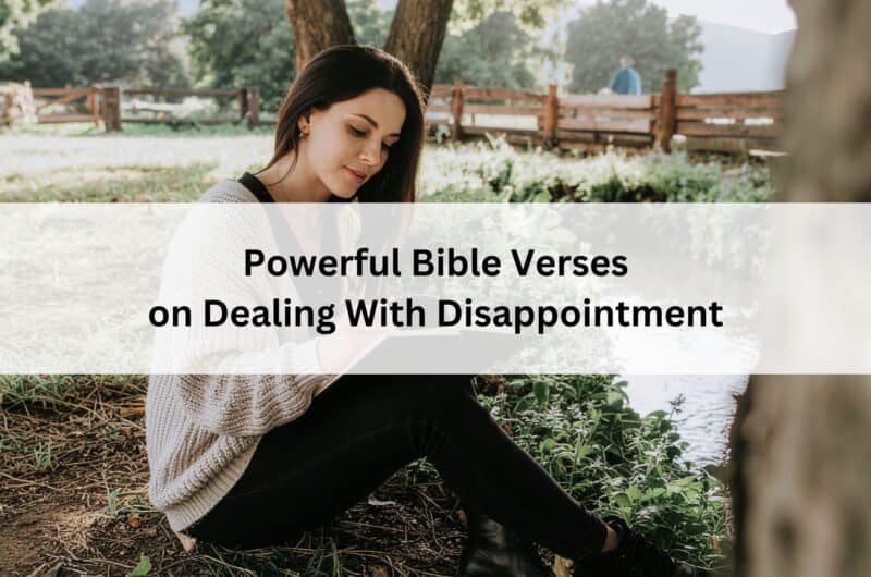 Woman sitting by a river under a tree, writing in a journal; overlay text reads βPowerful Bible Verses on Dealing With Disappointment.β