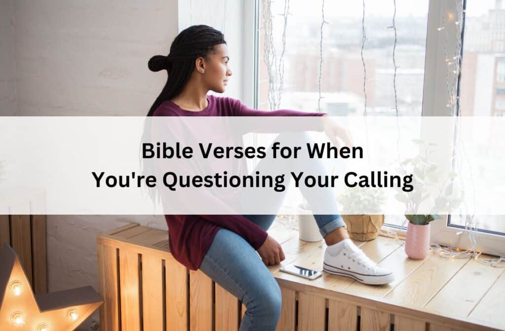 Woman sitting on a windowsill looking outside thoughtfully; overlay text reads “Bible Verses for When You're Questioning Your Calling.”