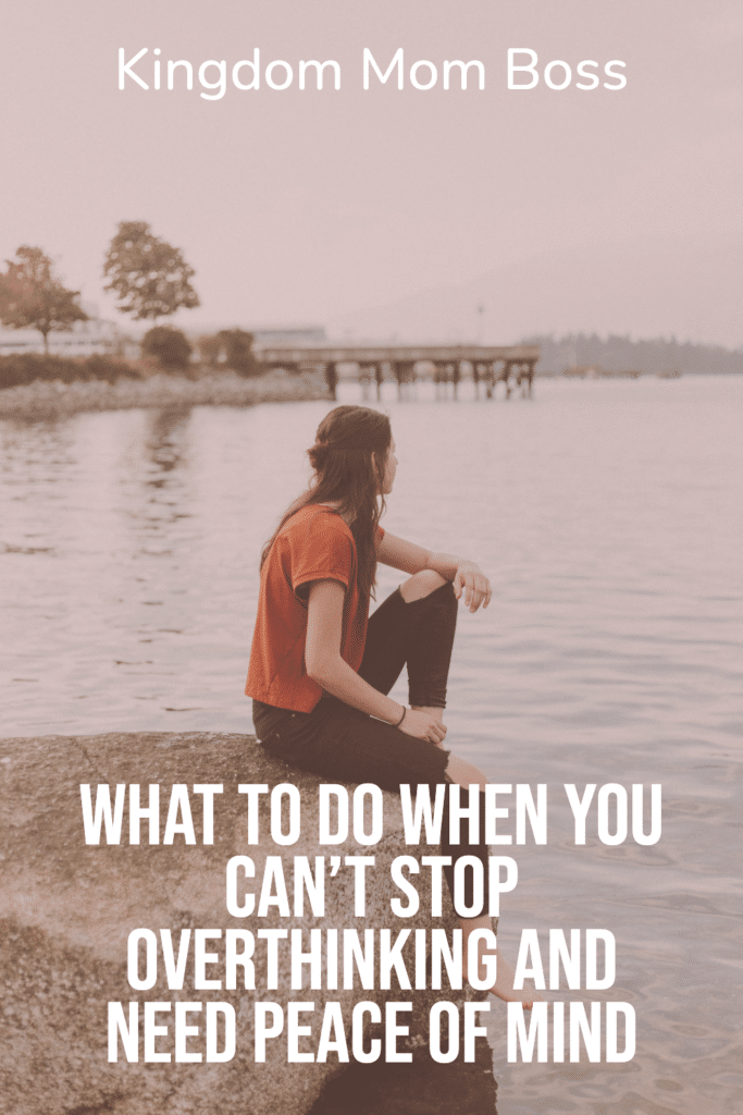Woman sitting on a rock by the water with text overlay What to Do When You Can’t Stop Overthinking and Need Peace of Mind.