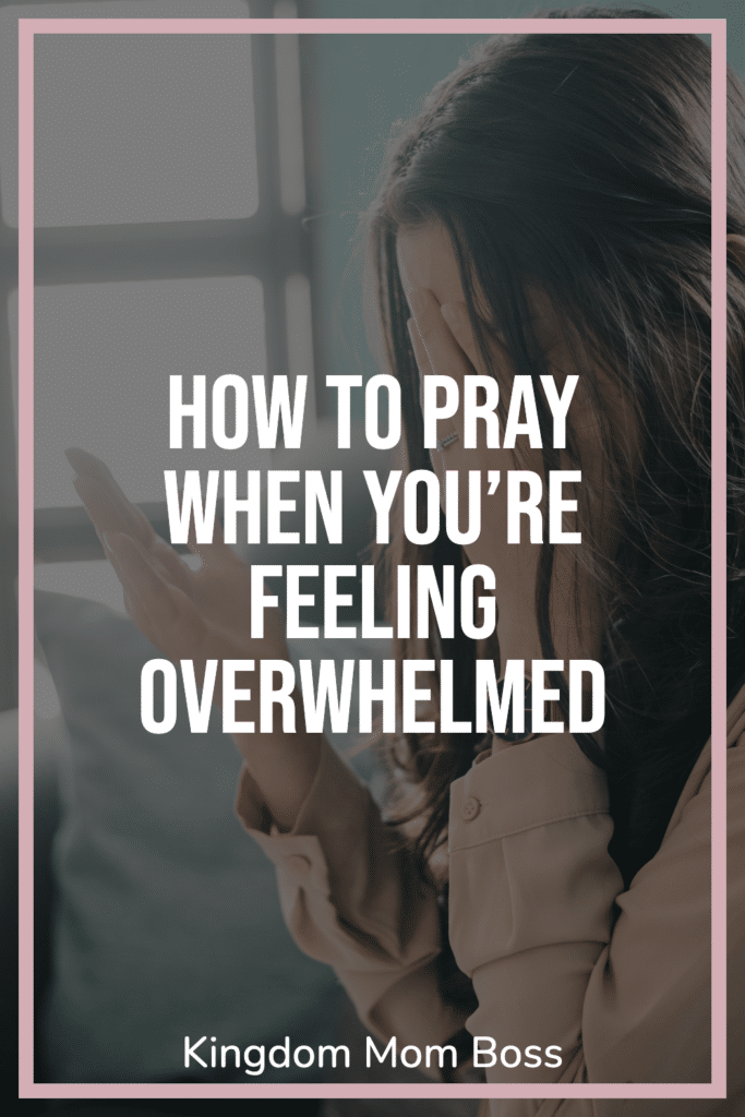 Woman praying by a window with text overlay How to Pray When You’re Feeling Overwhelmed, Kingdom Mom Boss.
