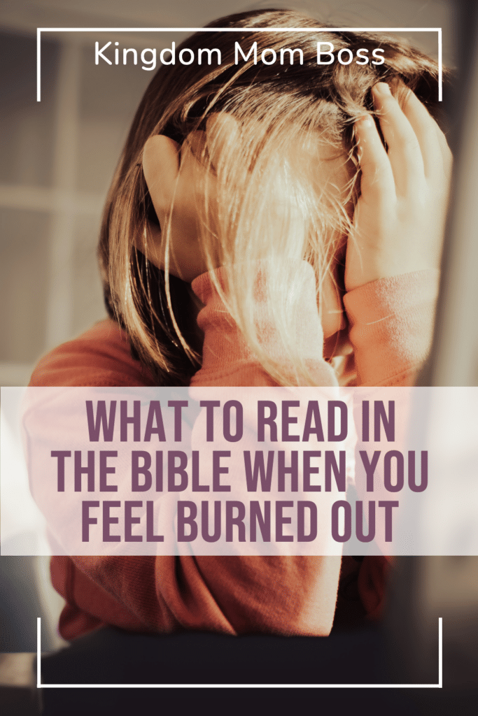 Woman in a sweatshirt holds her head in distress with text overlay What to Read in the Bible When You Feel Burned Out.